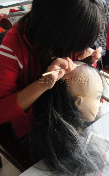 worker tie hair on wig lace